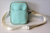 LACOSTE Sacoche Toile Enduite Bleu Ciel AQUA GREEN BE